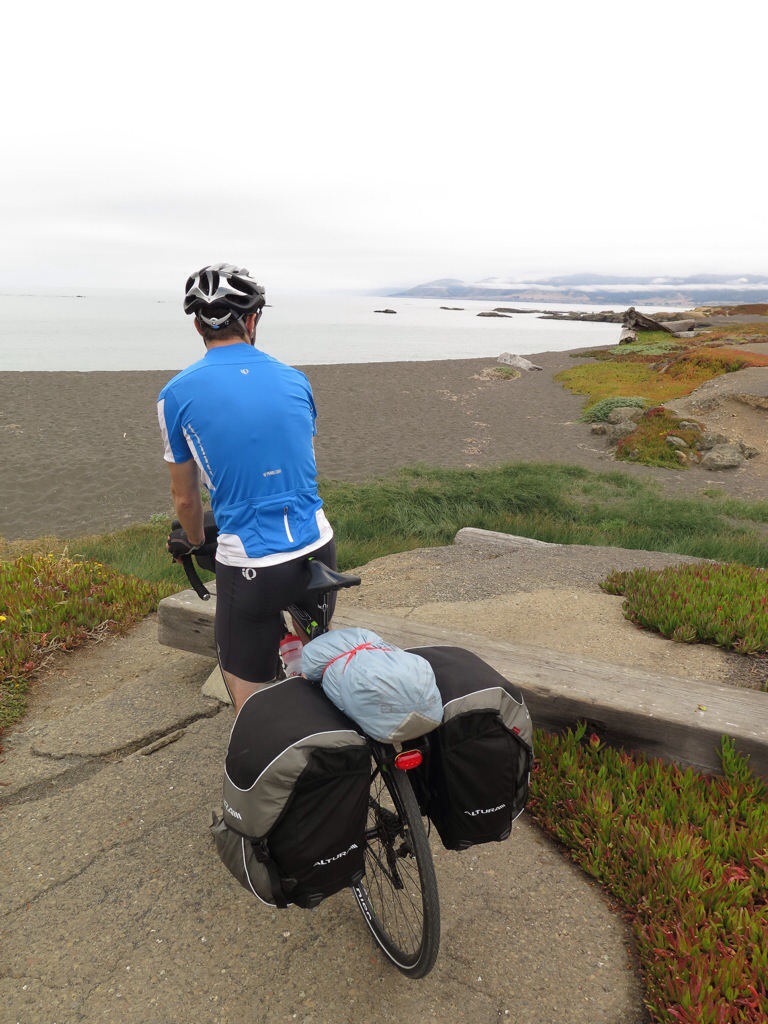 Large rear panniers and tent on the top of the rear rack